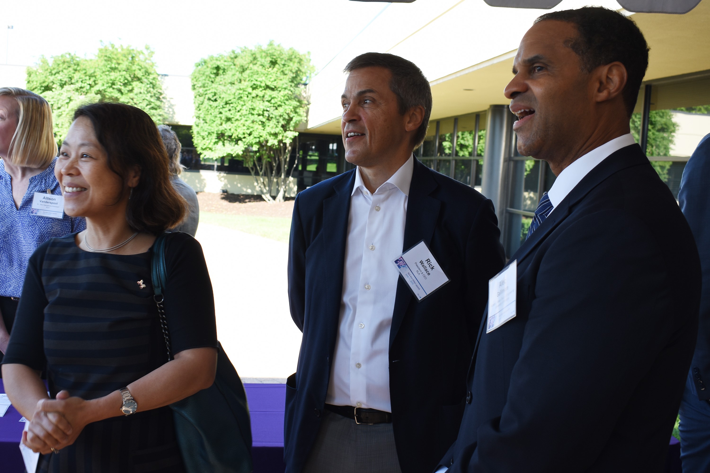 From left: Mingyan Liu (the Peter and Evelyn Fuss Chair of ECE), Rick Wallace (KLA CEO and President), and Alec Gallimore (the Robert J Vlasic Dean of Engineering)